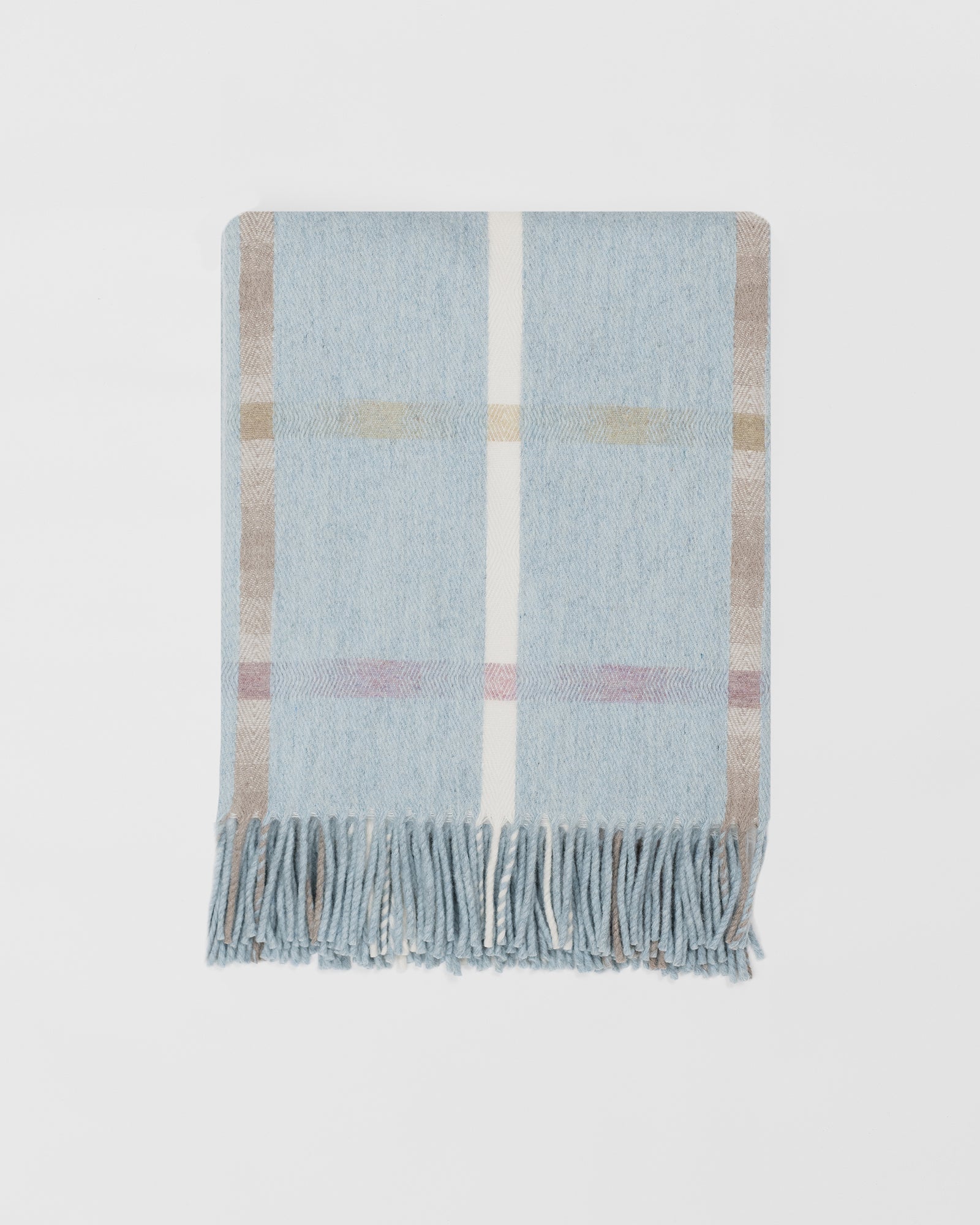 Remony maree arctic throw - check blanket with light blue, beige, and white colors on a light gray background