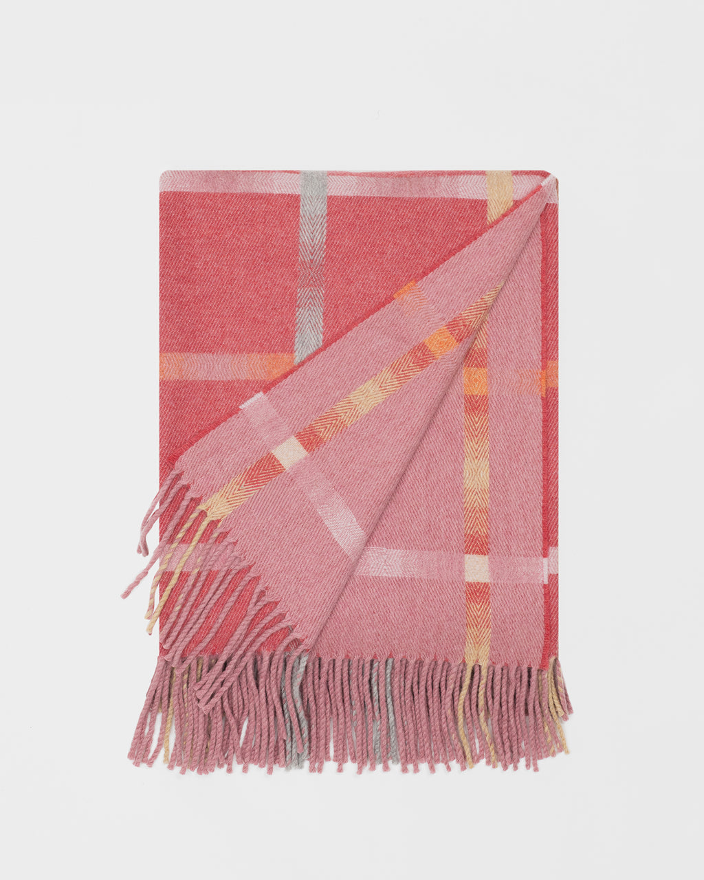 Remony maree ember throw - check blanket with fringes on a light gray background