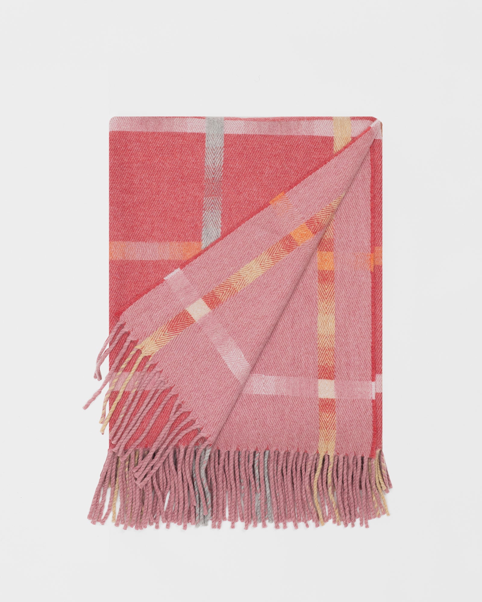 Remony maree ember throw - check blanket with fringes on a light gray background
