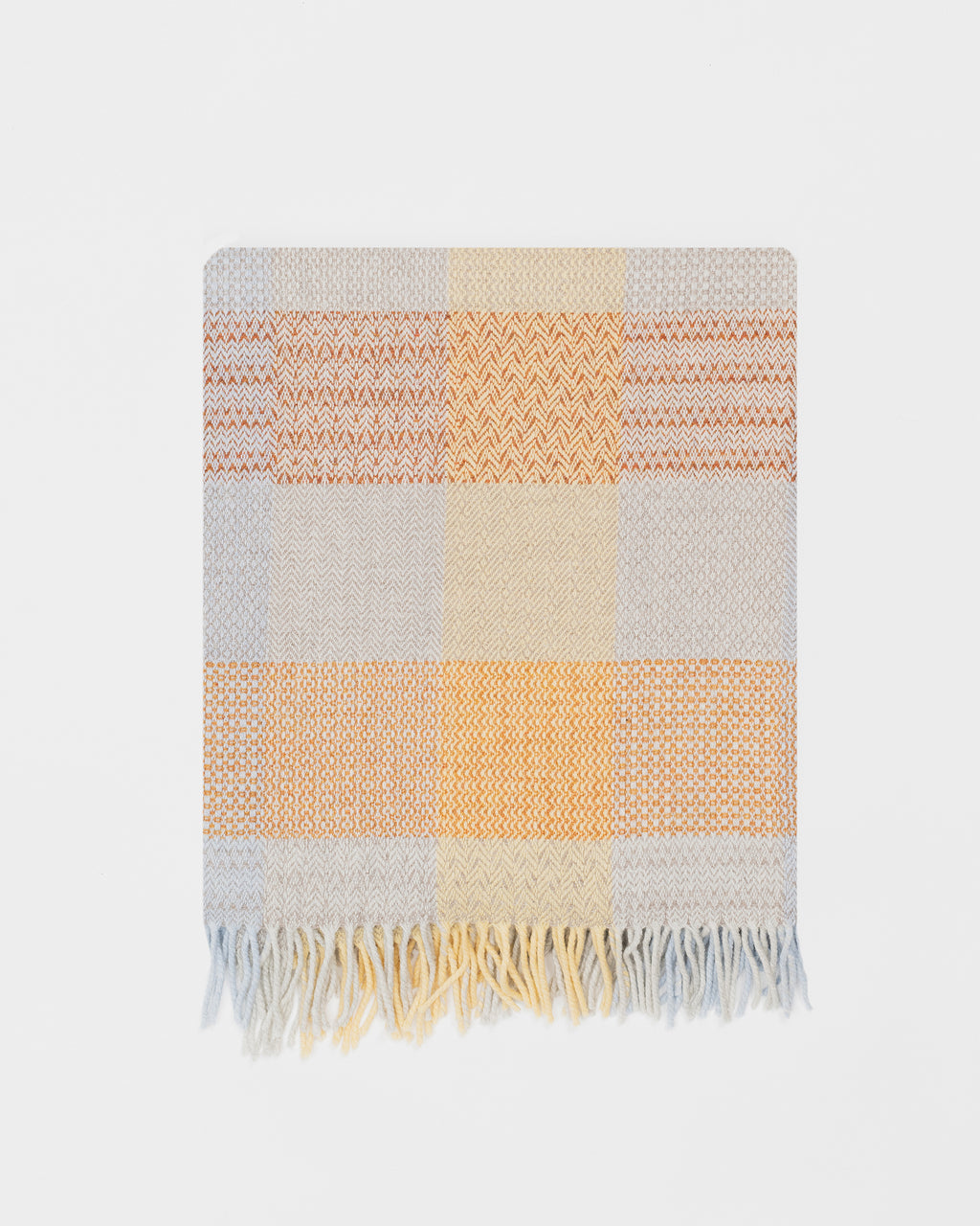 Remony Patchwork sunshine throw -  blanket with a checkered pattern in orange, yellow, and gray on a white background