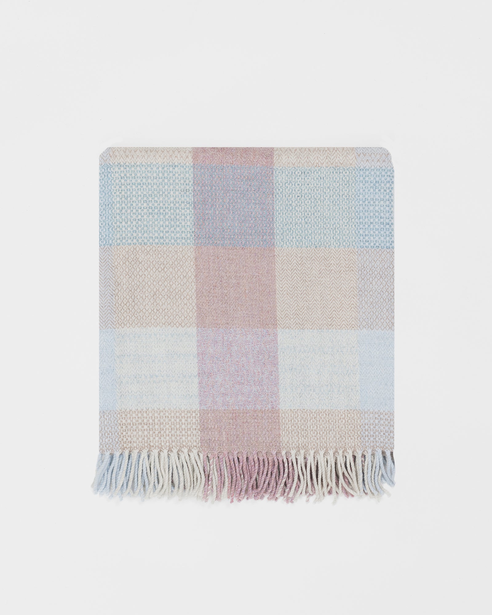 Remony patchwork sea breeze throw - blanket with pastel colors on a light gray background