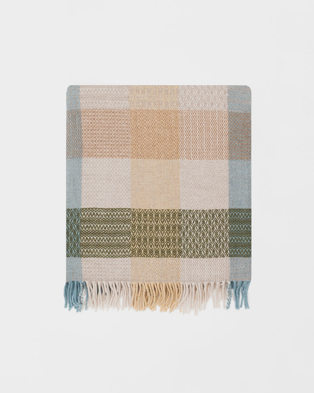 Remony patchwork hayloft throw - blanket with a checkered pattern on a light gray background