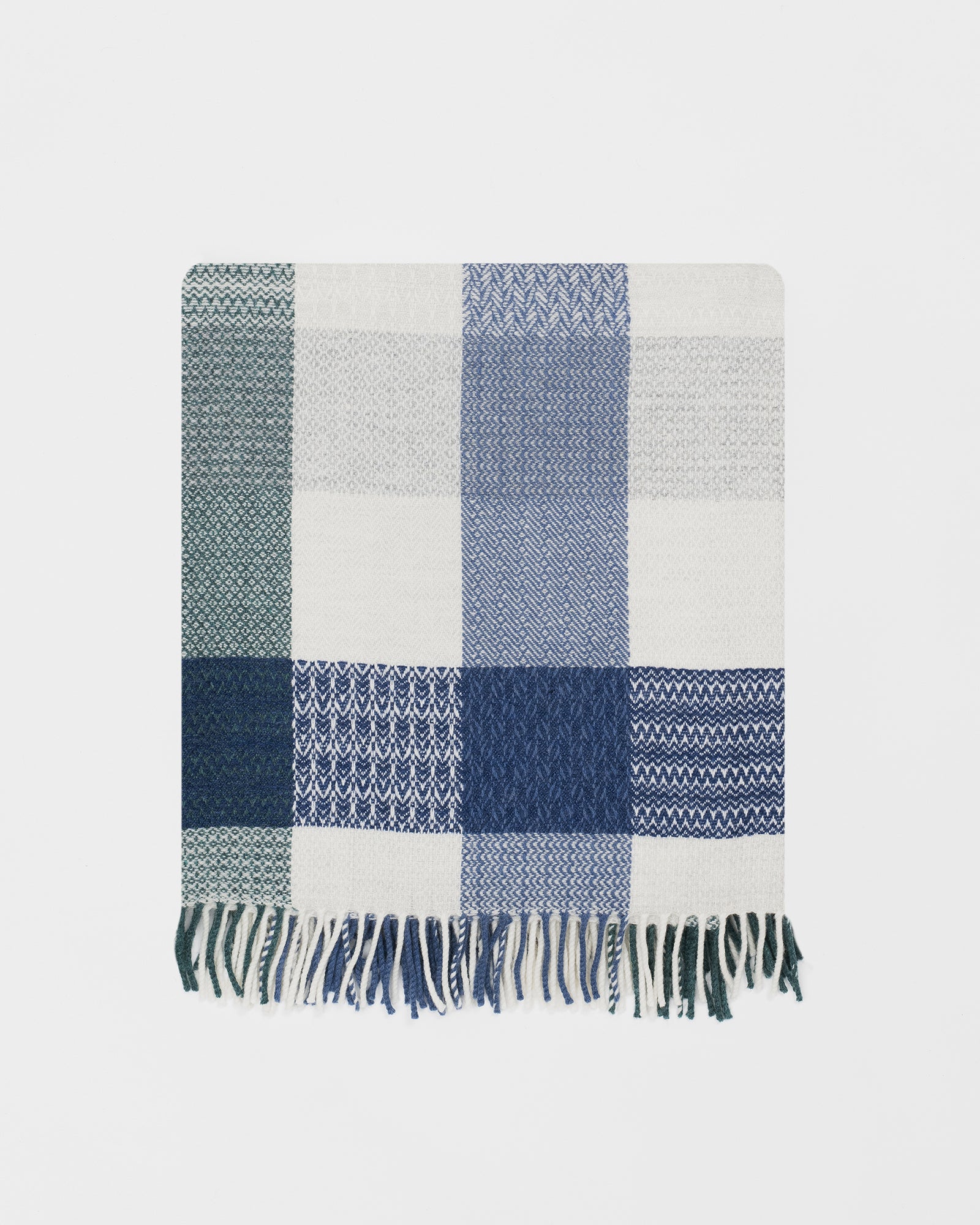 Remony moonlight patchwork throw - blanket with blue and green patterns on a white background