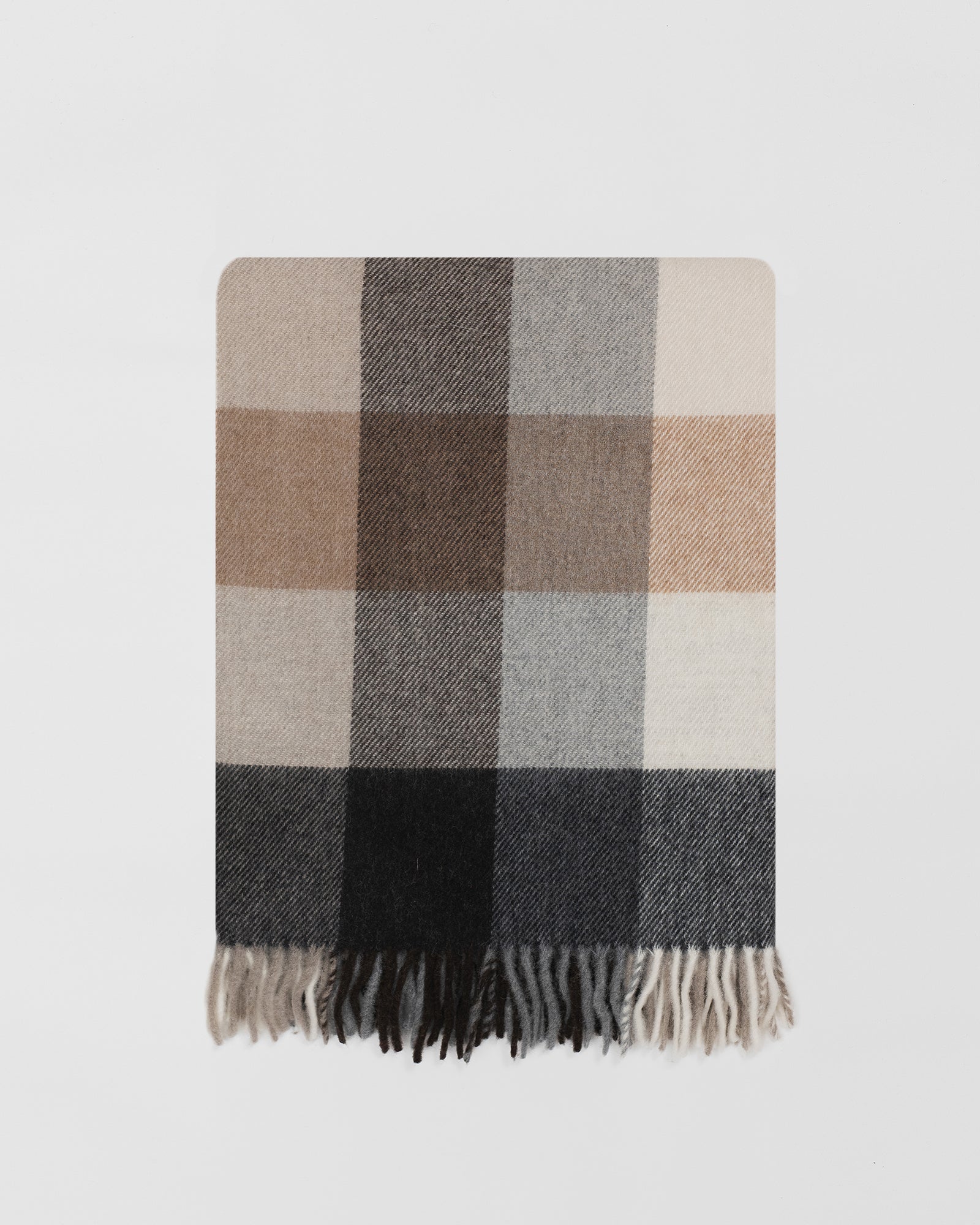 Remony dunira natural throw - Plaid blanket with brown, gray, and beige colors on a light gray background