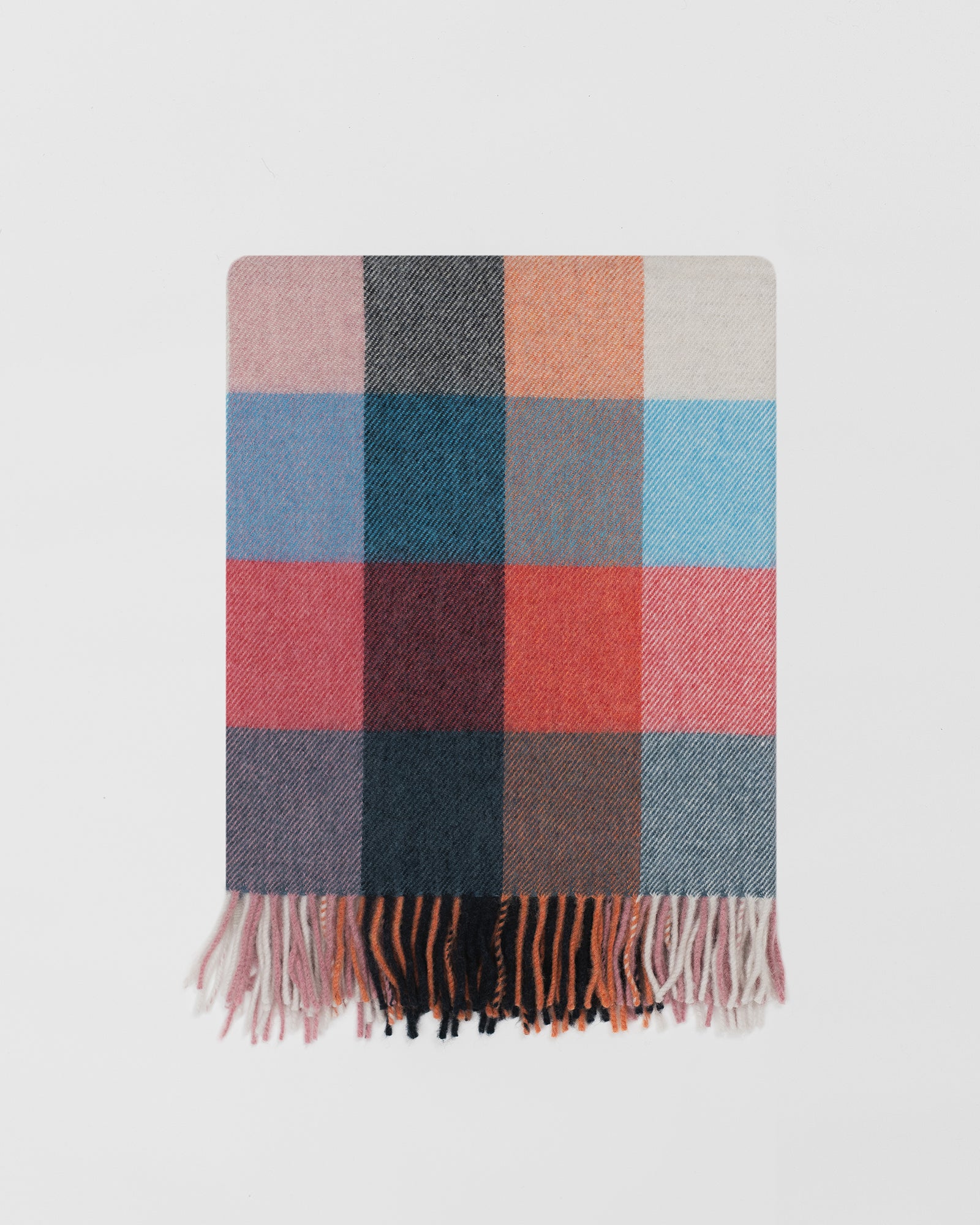 Remony dunira sorbet throw - Plaid blanket with multicolor pattern on a light gray background