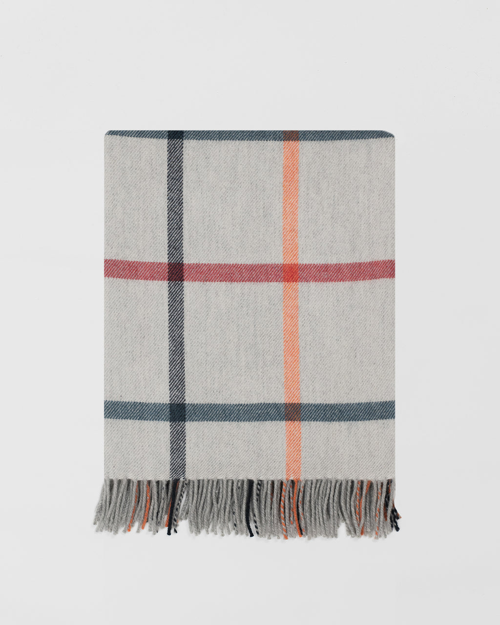 Remony milton melba throw - Plaid blanket with fringe on a light gray background