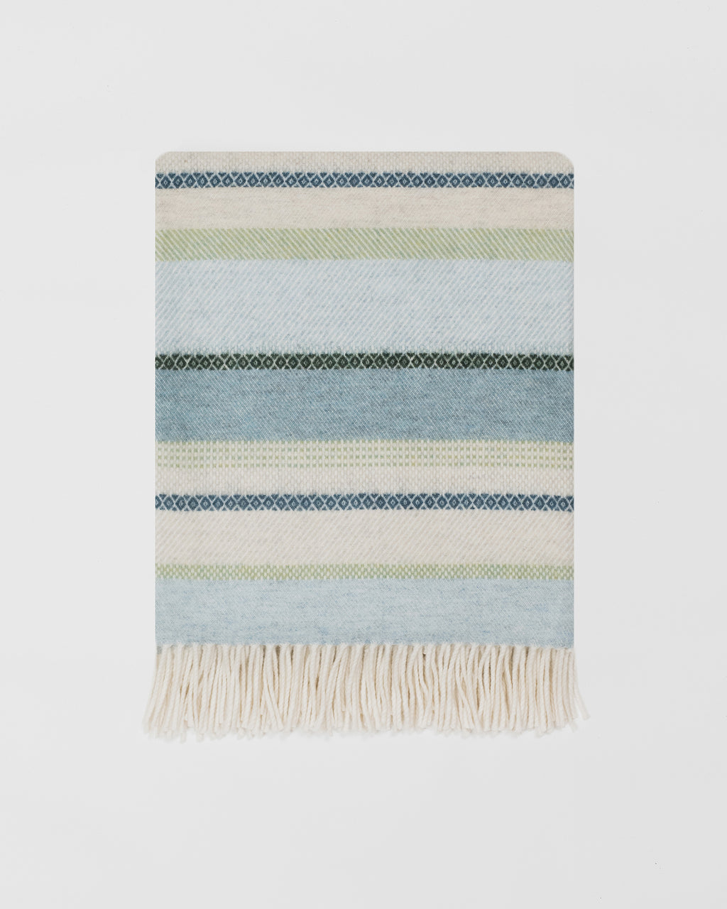 Remony croftmore seaglass throw - Striped woven blanket with fringes on a light gray background
